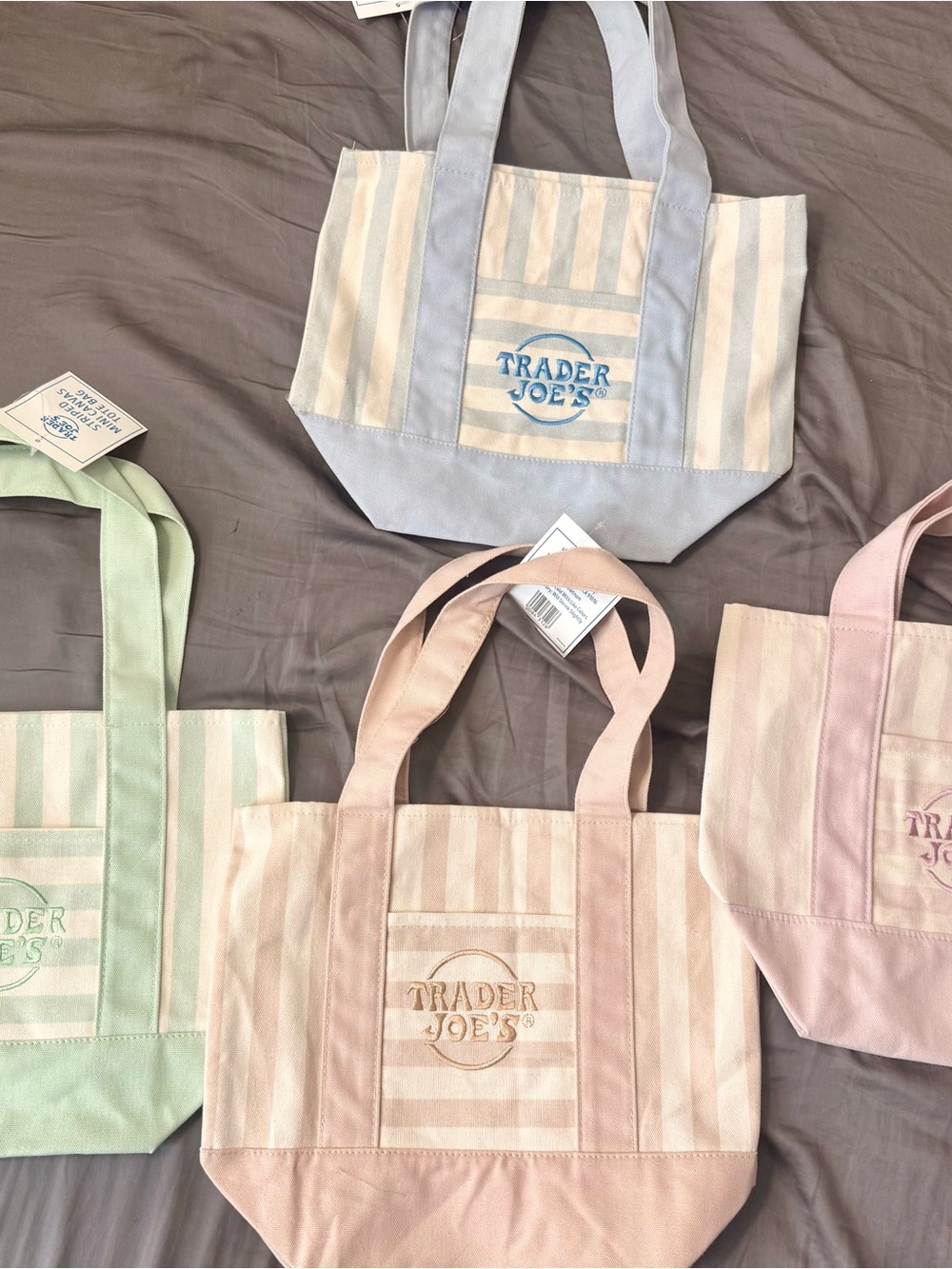 Trader Joe's Pastel color Striped Canvas Tote bags.